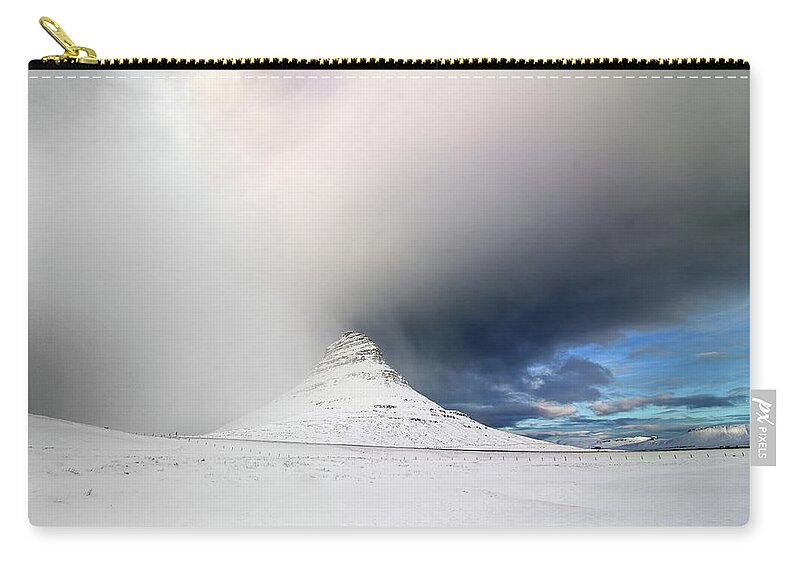 Iceland Zip Pouch featuring the photograph The cloak of winter by Christopher Mathews