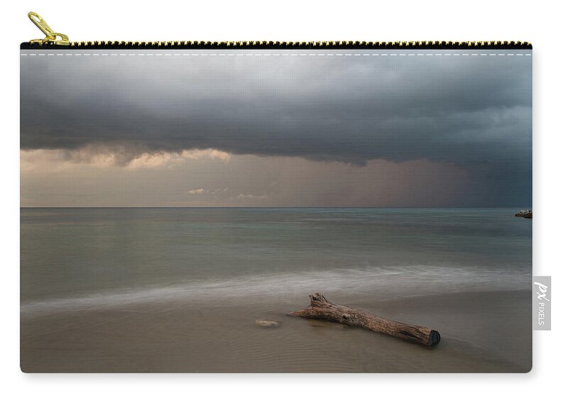 Storm Carry-all Pouch featuring the photograph The coming of the storm from ocean by Michalakis Ppalis