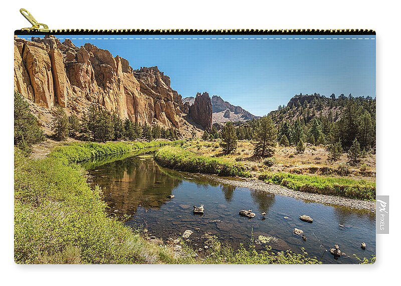 Travel Zip Pouch featuring the photograph The Crooked River by Peter Tellone