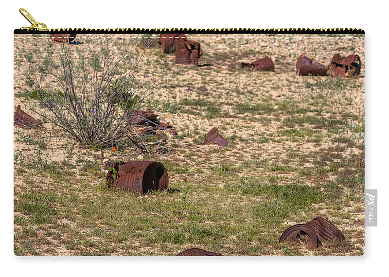 Rusty Zip Pouch featuring the photograph The desert if full with trash by Alessandra RC