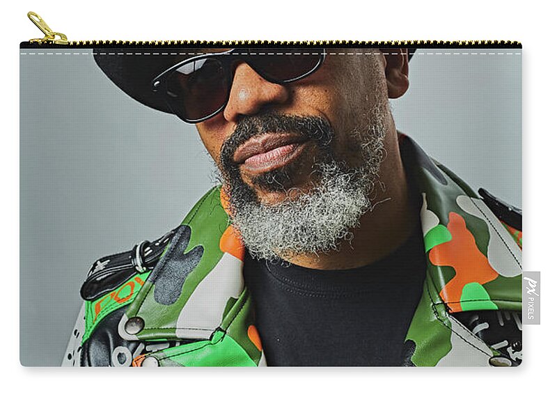  Zip Pouch featuring the photograph The Funk Master by Tony Camm