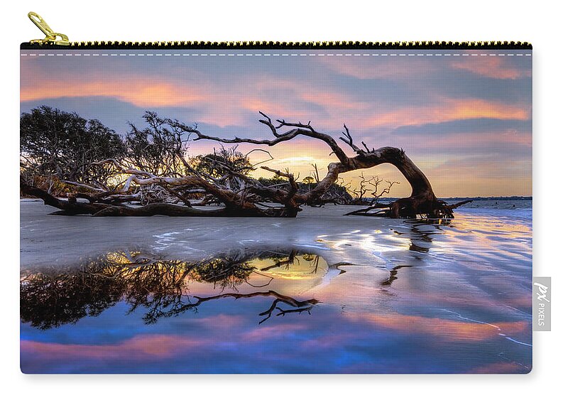 Clouds Zip Pouch featuring the photograph The Giant has Fallen Jekyll Island Sunrise by Debra and Dave Vanderlaan