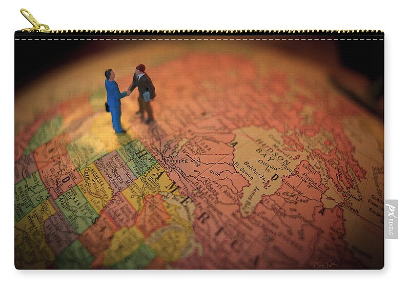 World Zip Pouch featuring the photograph The Handshake by Craig J Satterlee