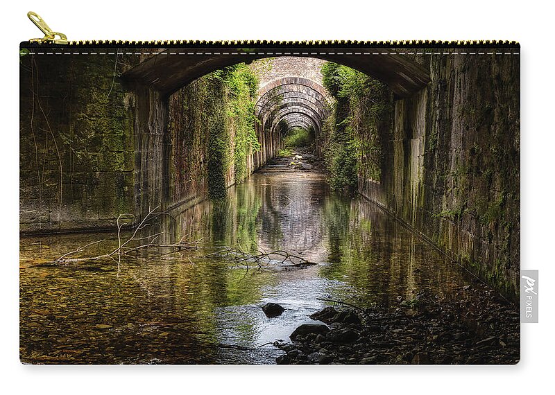 Factory Zip Pouch featuring the photograph The mysterious canal under an abandoned factory by Micah Offman