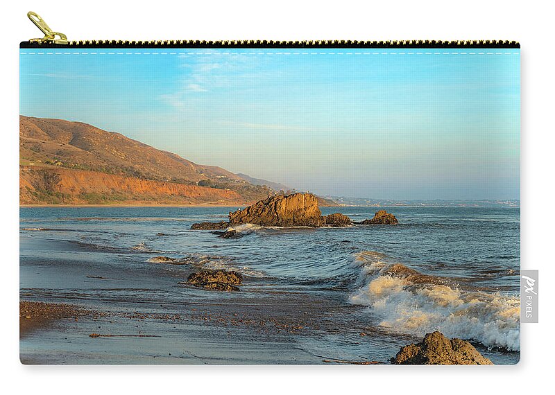 Beach Zip Pouch featuring the photograph The Off Shore Rock at Leo Carrillo State Beach by Matthew DeGrushe