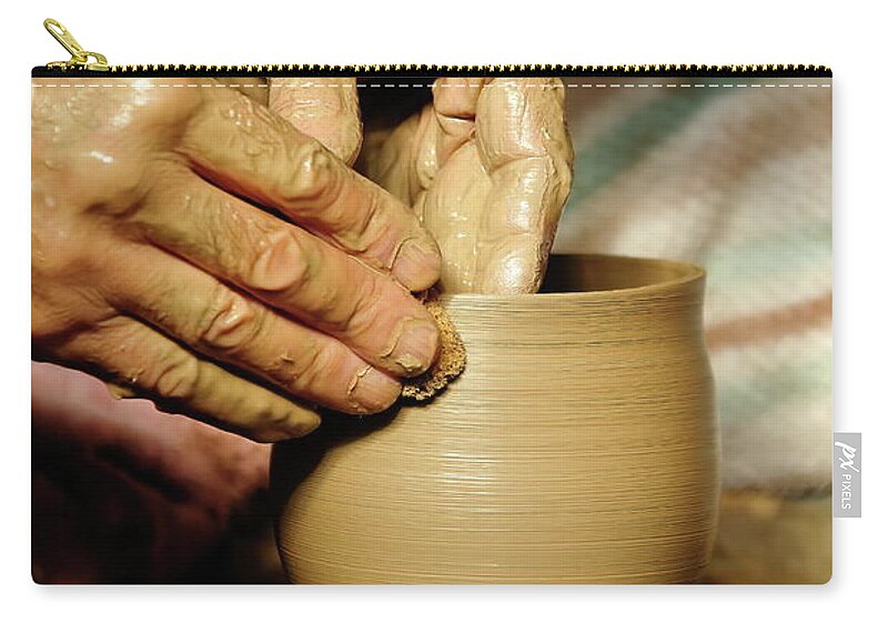 Ceramic Zip Pouch featuring the photograph The Potter's Hands by Lens Art Photography By Larry Trager