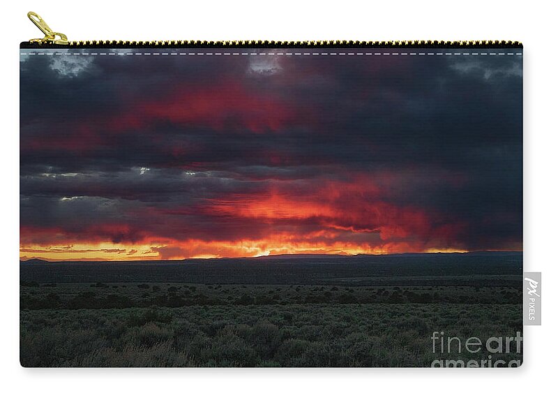 Taos Zip Pouch featuring the photograph The Rise of the Phoenix Full SHOT by Elijah Rael