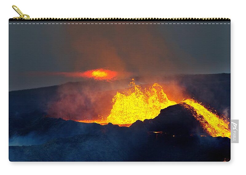 Volcano Zip Pouch featuring the photograph The Sunset and the Flame by Christopher Mathews