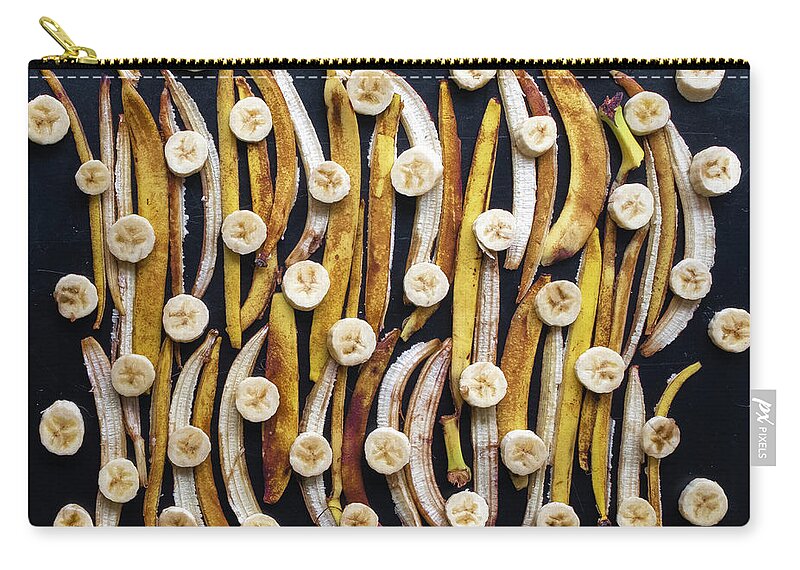 The Whole Banana Art Zip Pouch featuring the photograph The Whole Banana Art by Sarah Phillips