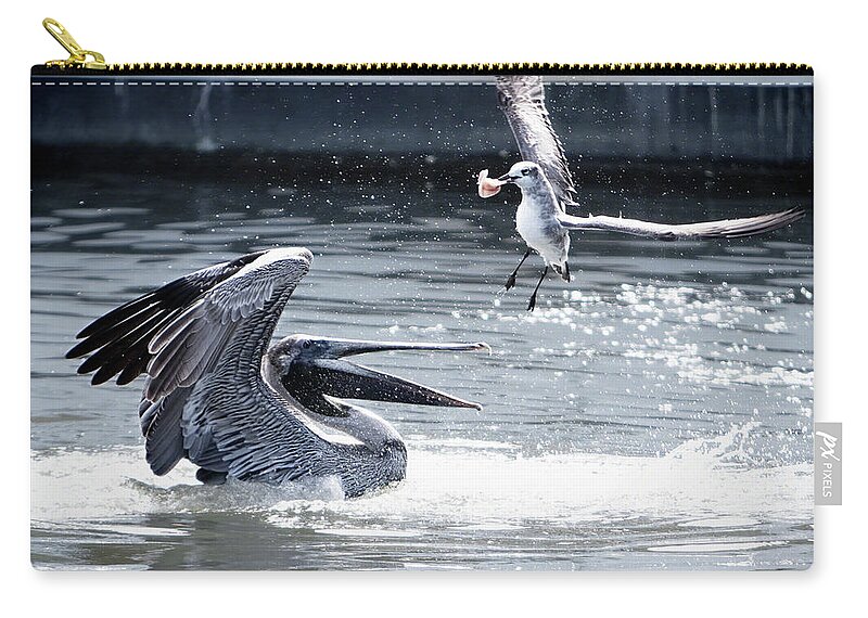 Pelican Zip Pouch featuring the photograph The Winner by Linda Lee Hall