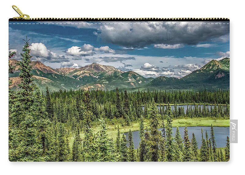 Alaska Zip Pouch featuring the photograph This Land is Your Land by Marcy Wielfaert