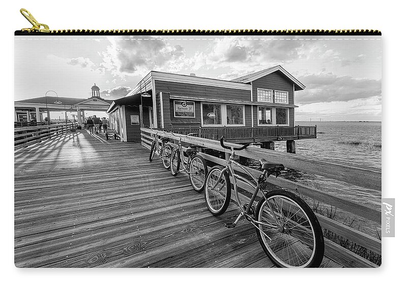 Black Zip Pouch featuring the photograph Three Bicycles on the Dock Black and White Jekyll Island by Debra and Dave Vanderlaan
