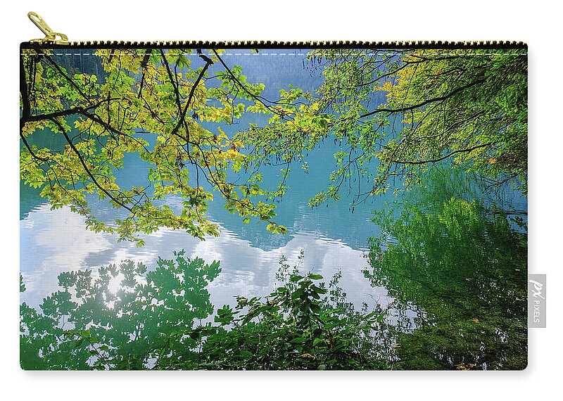 Italy Zip Pouch featuring the photograph Tovel Lake #5 by Alberto Zanoni
