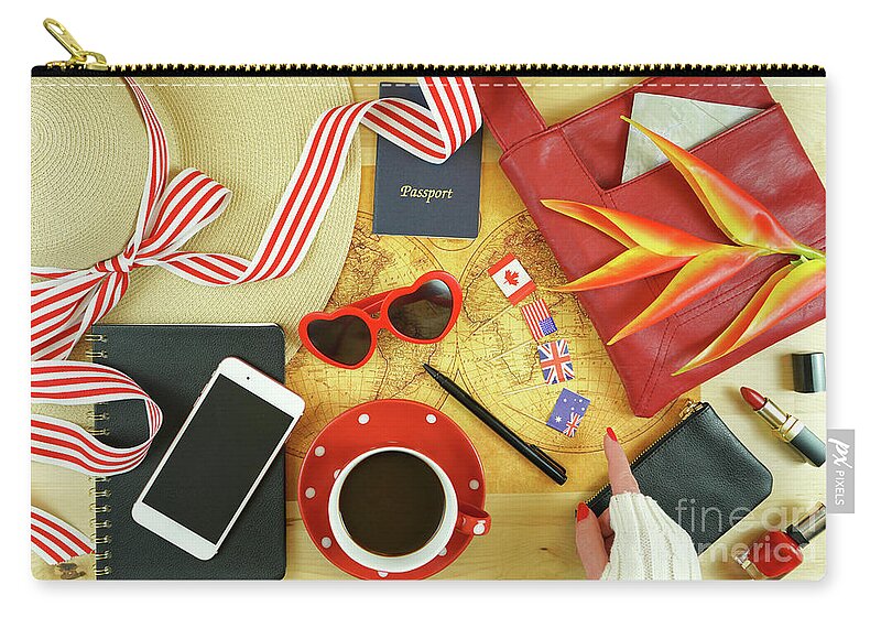 Travel Zip Pouch featuring the photograph Travel concept planning with accessories and old pre-1900 map of the world. by Milleflore Images