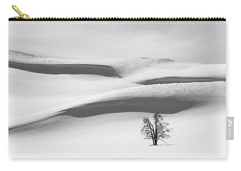 Tree Zip Pouch featuring the photograph Tree on Snow by Alex Lapidus