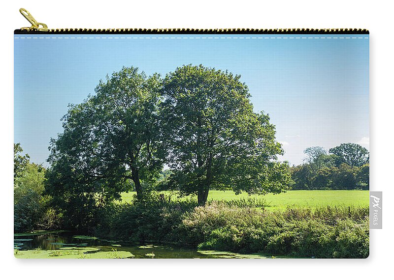 River Zip Pouch featuring the photograph Trees By The River Stour Blandford by Tanya C Smith