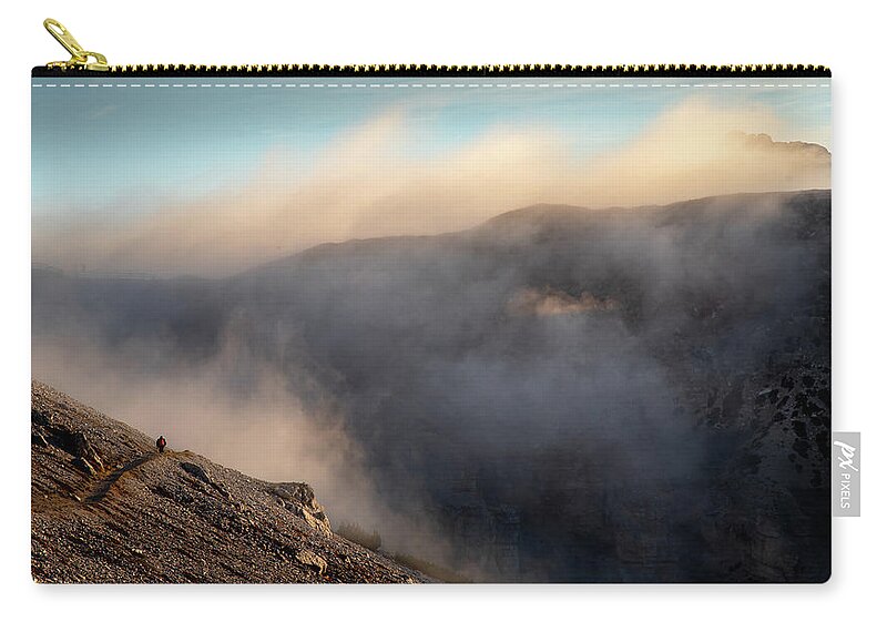 Italy Carry-all Pouch featuring the photograph Trekking at  at the Tre Cime hiking path area in South Tyrol in by Michalakis Ppalis