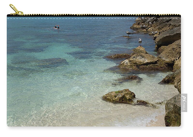 Mediterranean Zip Pouch featuring the photograph Turquoise blue sea water and rocks in Calpe 3 by Adriana Mueller