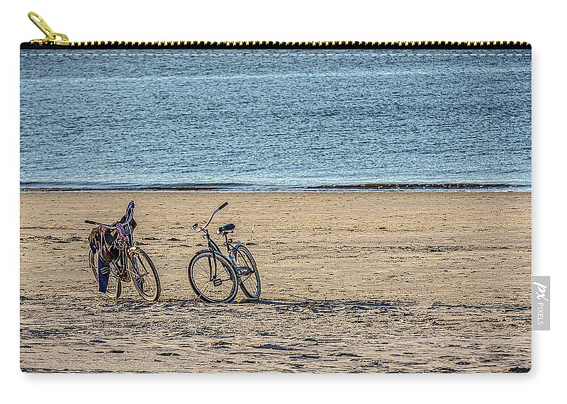 Ball Zip Pouch featuring the photograph Two Bikes and Ball on Beach by Darryl Brooks