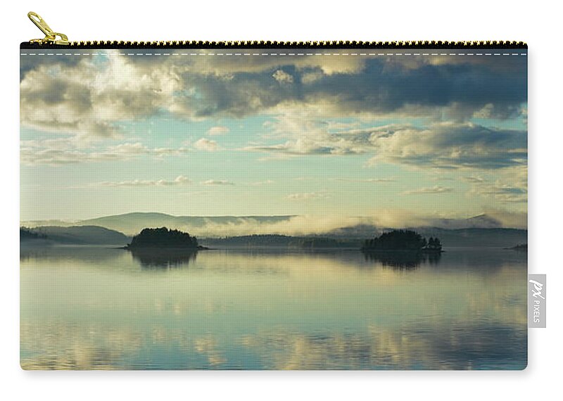 Autumn Zip Pouch featuring the photograph Two islands and the cloudy sky are reflected in a glassy lake by Ulrich Kunst And Bettina Scheidulin