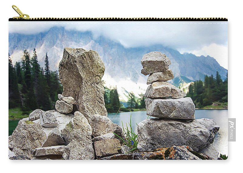 Two Carry-all Pouch featuring the photograph Two stone towers as route markers. by Bernhard Schaffer