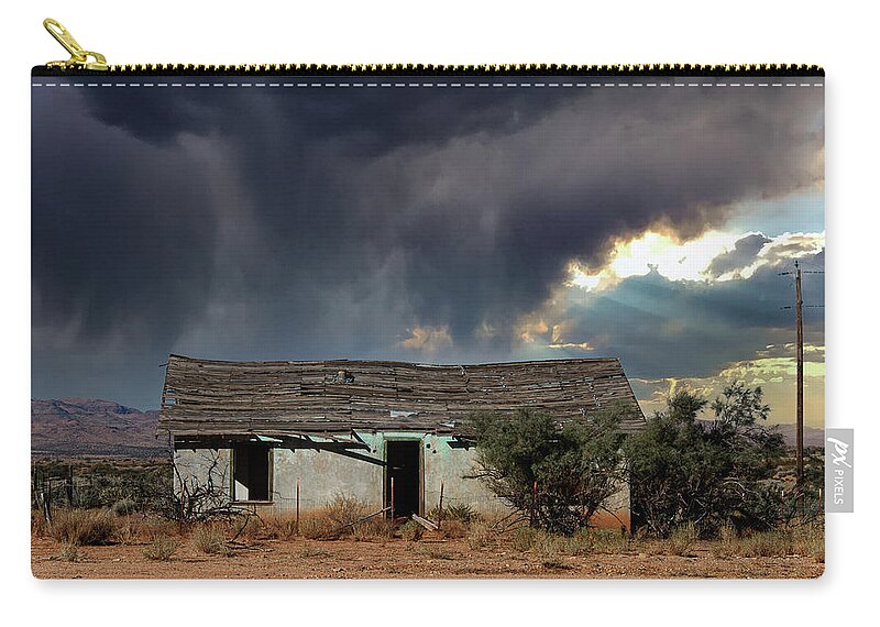 Clouds Zip Pouch featuring the photograph Under the Stormy Skies by Carmen Kern