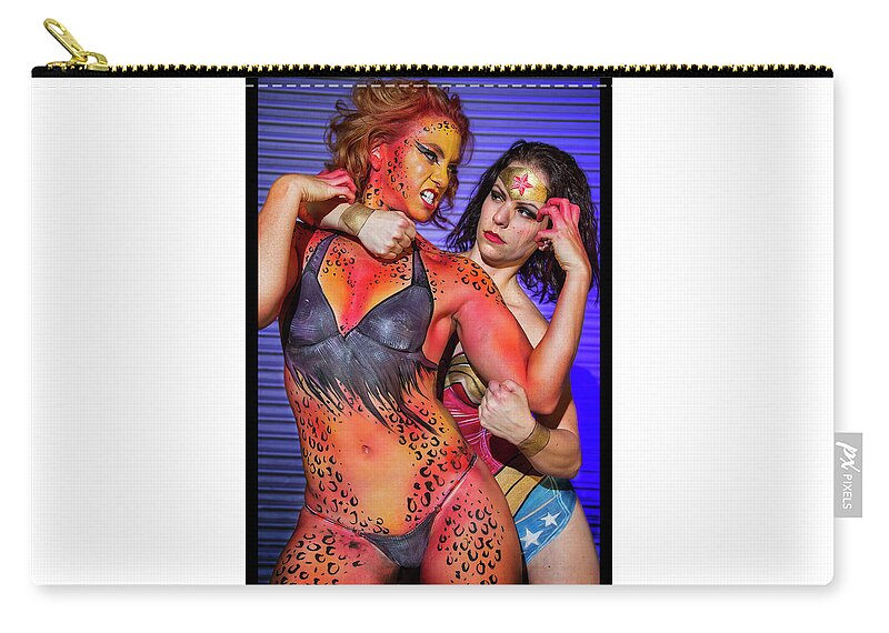 Cosplay Zip Pouch featuring the photograph Wonder Woman vs Cheetah by Christopher W Weeks