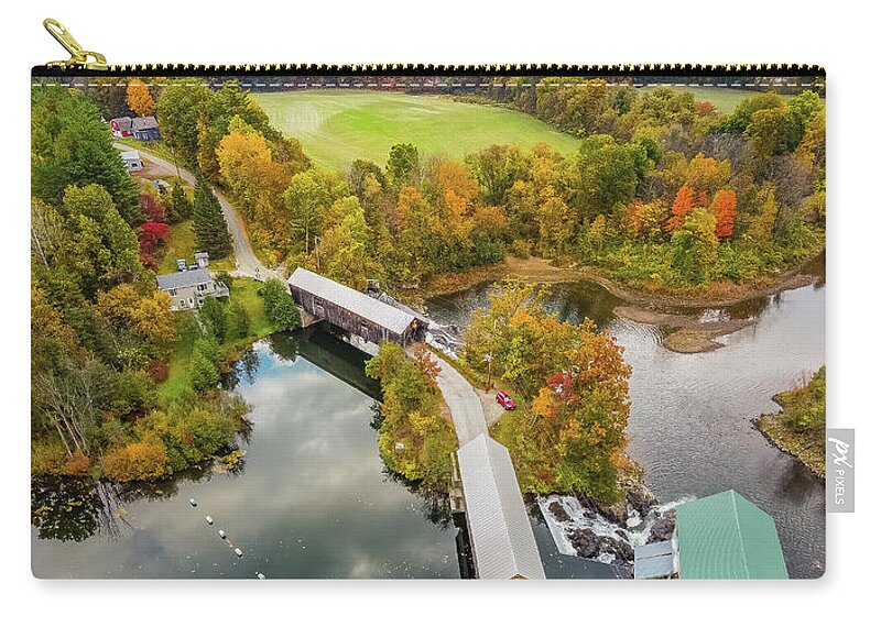 Hartland Vermont Zip Pouch featuring the photograph Vertical Vermont autumn colors over the Willard Twin Bridges by Jeff Folger