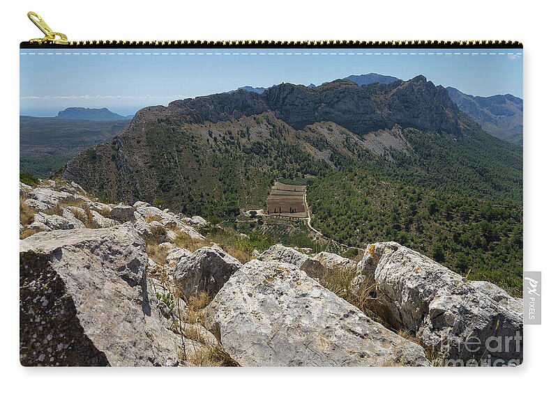 Mountains Zip Pouch featuring the photograph Mountain range and rocks on the Mediterranean coast by Adriana Mueller