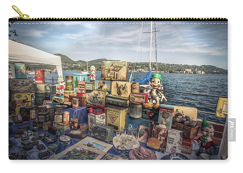 Orta Zip Pouch featuring the photograph Vintage Markeplace Stand On Lake Orta by Luca Lorenzelli