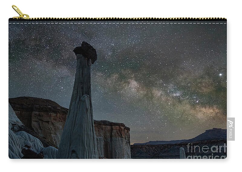 The Rim Rocks Zip Pouch featuring the photograph Wahweap Hoodoo under the Milky way by Keith Kapple