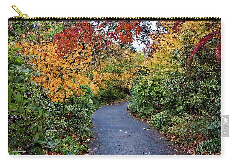 Alex Lyubar Zip Pouch featuring the photograph Walking path through the autumn park by Alex Lyubar