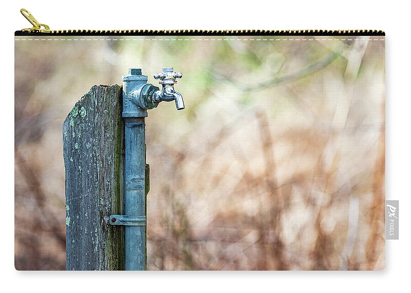 Water Fountain Zip Pouch featuring the photograph Autumn Water Spigot #1 by Amelia Pearn