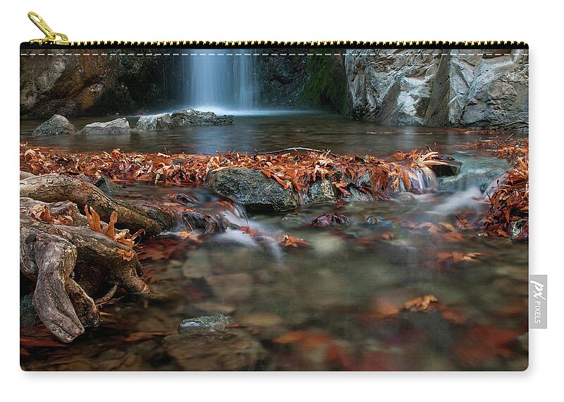 Troodos Zip Pouch featuring the photograph Waterfall and river flowing with maple leaves on the rocks on the river in Autumn by Michalakis Ppalis