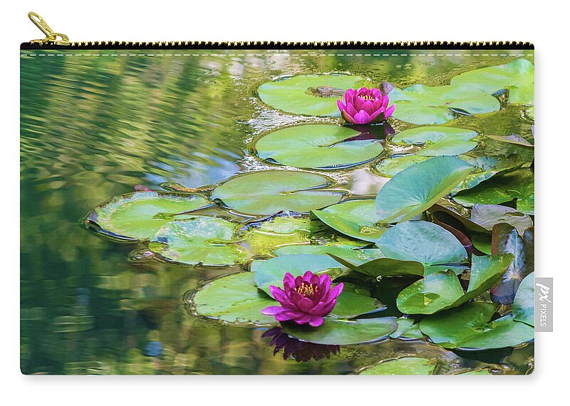 Waterlilies Zip Pouch featuring the photograph Waterlilies at Gibbs Gardens by Mary Ann Artz