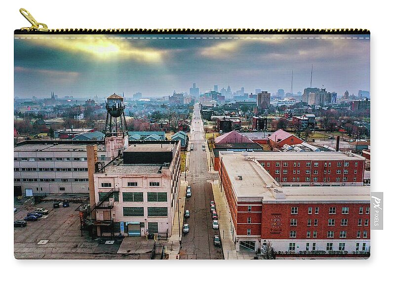 Detroit Zip Pouch featuring the photograph Watertower Skyline DJI_0690 by Michael Thomas