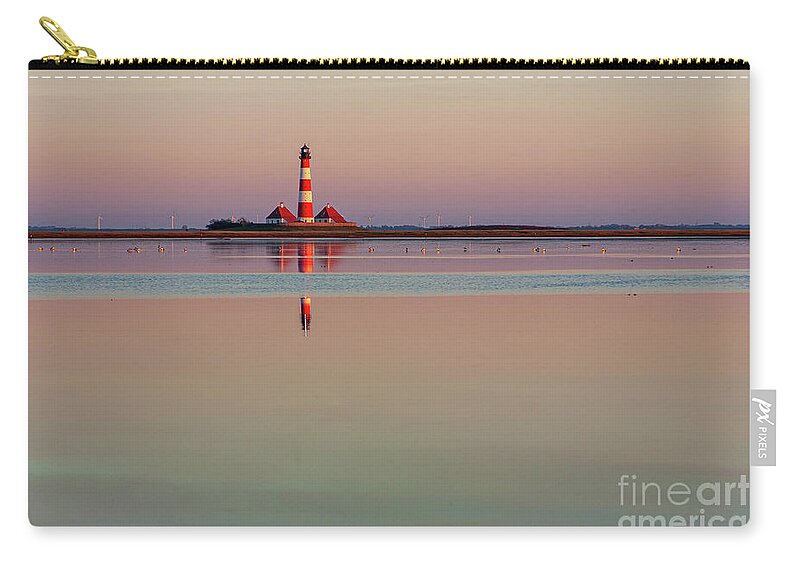 Lighthouse Zip Pouch featuring the photograph Westerhever Lighthouse by Heiko Koehrer-Wagner
