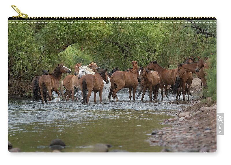 Wild Horses Zip Pouch featuring the photograph White Stallion Charging Through by Meg Leaf