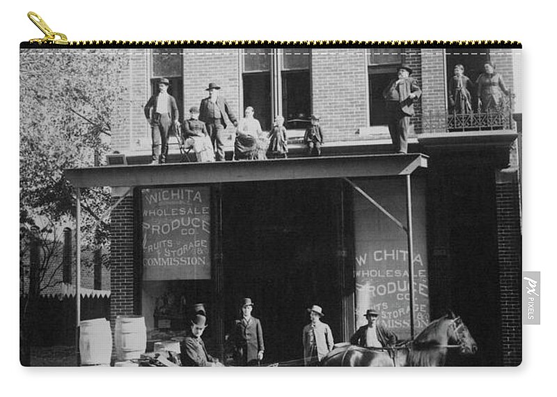 Wichita Zip Pouch featuring the photograph Wholesale by Brian Duram