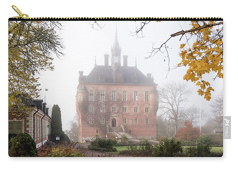 Wik Castle Carry-all Pouch featuring the photograph Wik Castle a foggy autumn morning by Torbjorn Swenelius