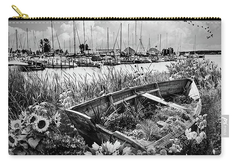 Black Zip Pouch featuring the photograph Wildflowers Rowboat in the Harbor Black and White by Debra and Dave Vanderlaan