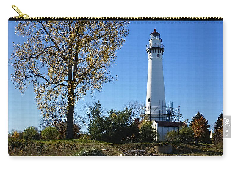 Wind Point Lighthouse Zip Pouch featuring the photograph Wind Point Lighthouse by Deb Beausoleil