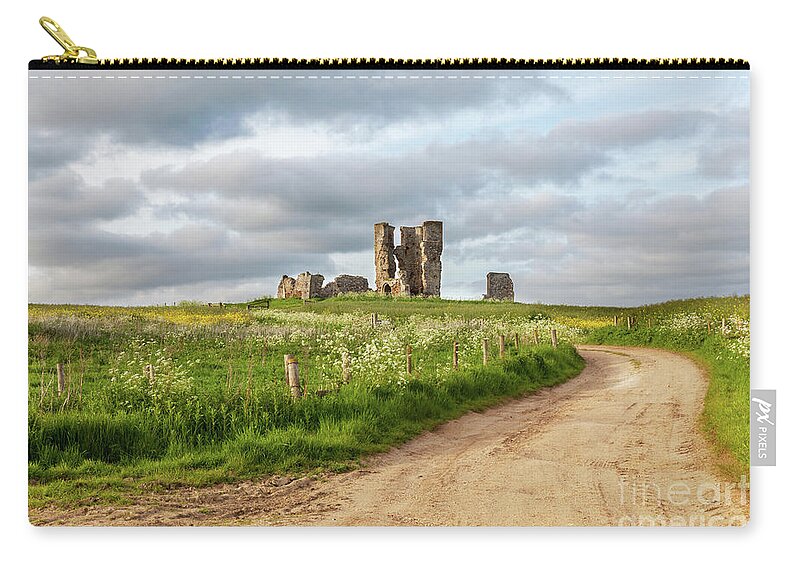 British Carry-all Pouch featuring the photograph Winding road leading to a chirch ruin in Norfolk by Simon Bratt