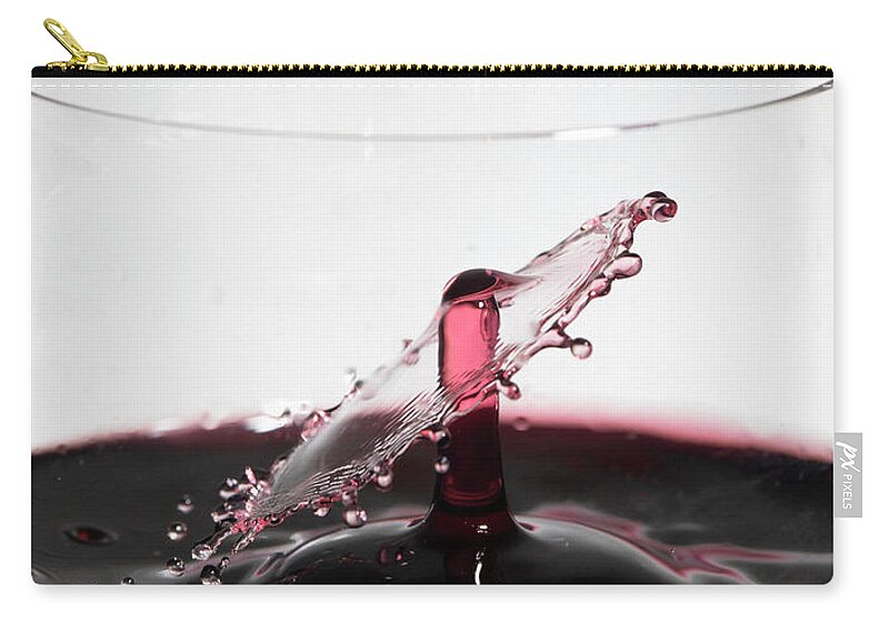 North Wilkesboro Zip Pouch featuring the photograph Wine Drops Collide Inside Glass by Charles Floyd