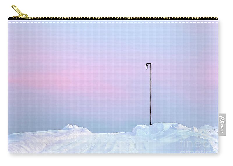 Winter Sunset Pastel Shades Russia Snow Snowdrift Road Pink Post Snowdrifts Blue Sky Impression Impressionistic Conceptual Expressive Creative Contemporary Atmospheric Minimalistic Minimalist Dusk Calm Serene Tranquil Tranquillity Charming Aesthetic Artistic Stylish Style Single Lonely Loneliness Alone Solo Solitary Beautiful Stunning Magnificent Landscape Mindfulness Serenity Inspirational Magic Poetic Singular Powerful Delightful Appealing Simplicity Delicate Gentle Evocative Simple Watercolor Zip Pouch featuring the photograph Winter sunset in pastel shades A lamp post on snowy road with sunset reflections on snow by Tatiana Bogracheva