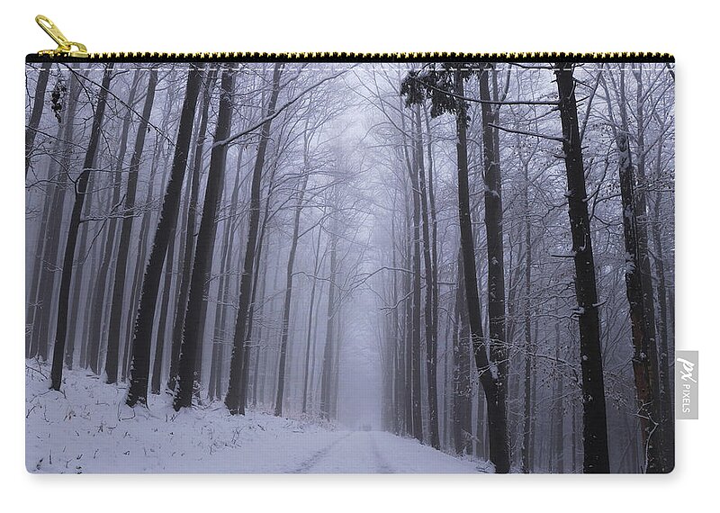 Beskydy Zip Pouch featuring the photograph Winter unmaintained forest road from the realm of dreams with a magical and unforgettable atmosphere on the edge of Beskydy mountains, czech republic, europe. Winter fog. Haze is gorgeous by Vaclav Sonnek