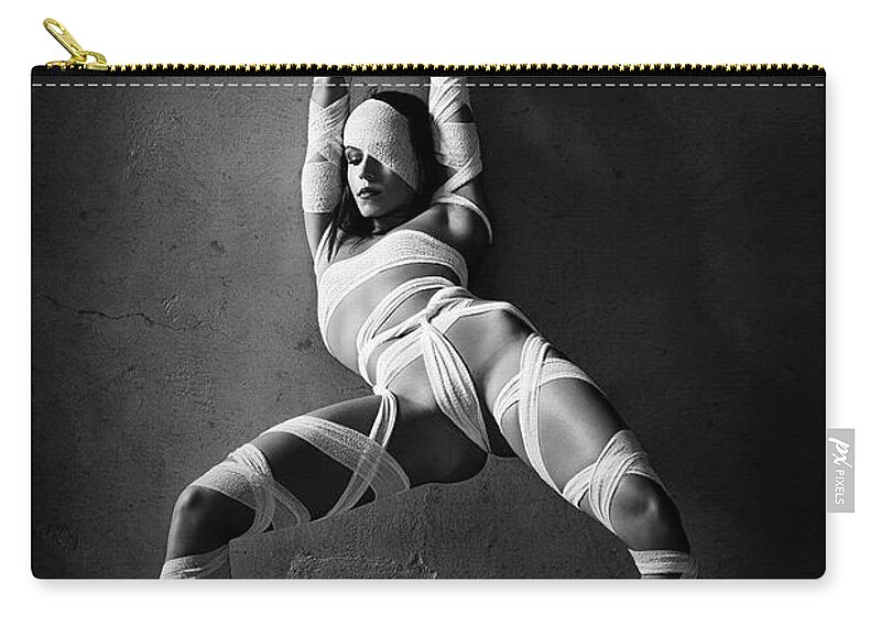 Woman Zip Pouch featuring the photograph Woman tied up in bandages by Johan Swanepoel