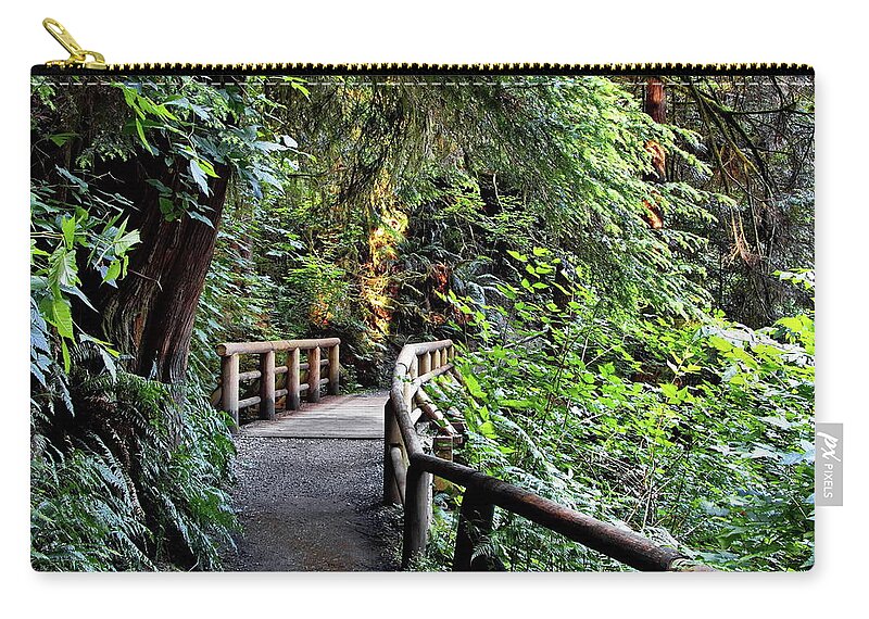 Alex Lyubar Zip Pouch featuring the photograph Wooden bridge on a firest hiking trail by Alex Lyubar