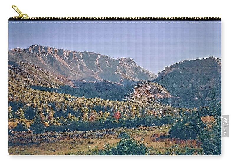 Wyoming Zip Pouch featuring the photograph Wyoming Mountains by Katie Dobies
