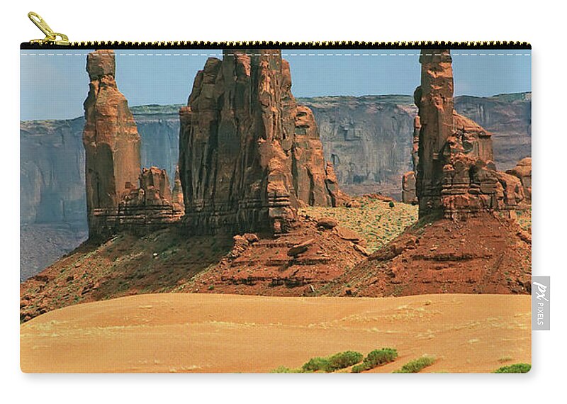 Scenery Zip Pouch featuring the photograph Yei bi Chei and Totem Pole - Monument Valley Tribal Park Navajo Nation Arizona U.S.A by Paolo Signorini